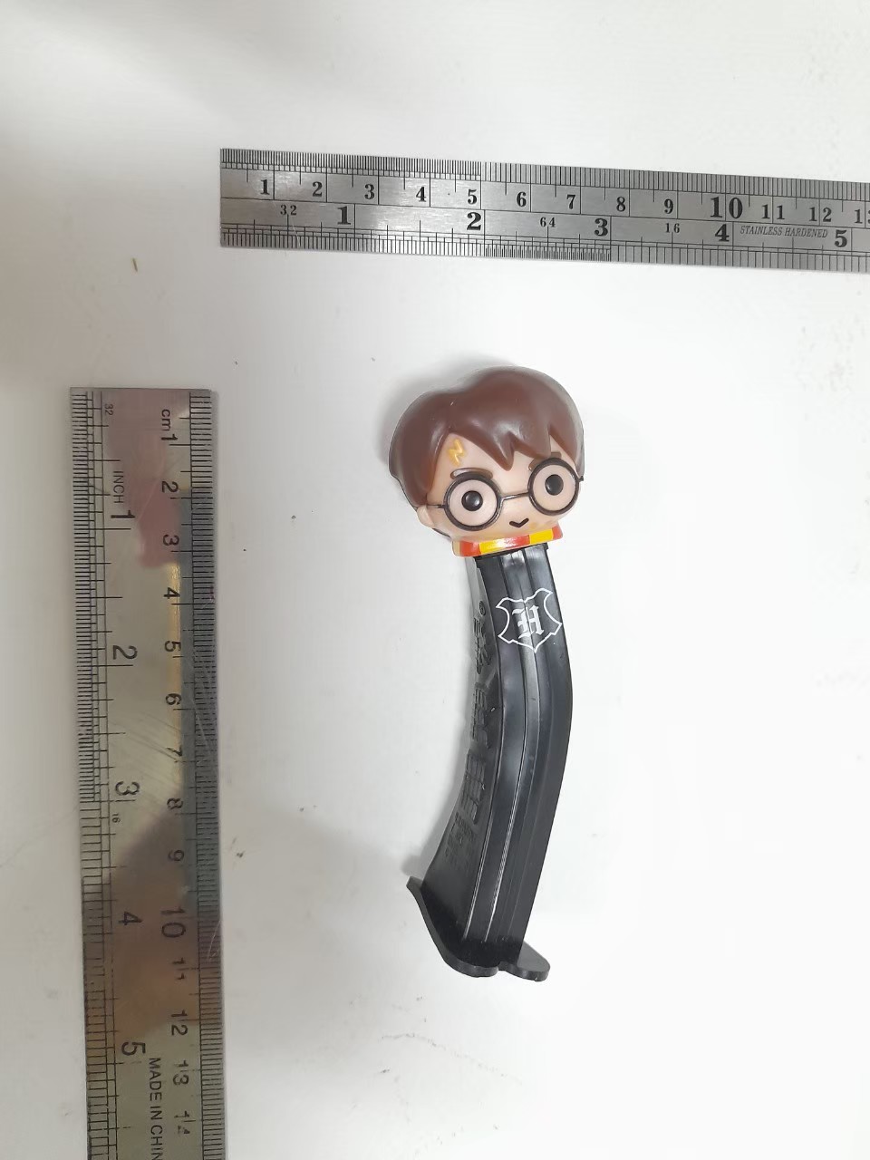 มีหลายภาพ,ที่ใส่ขนมPEZ ลาย แฮรรี่ พอตเตอร์ **โดนความร้อน บิดงอ มือ2ขายตามสภาพ