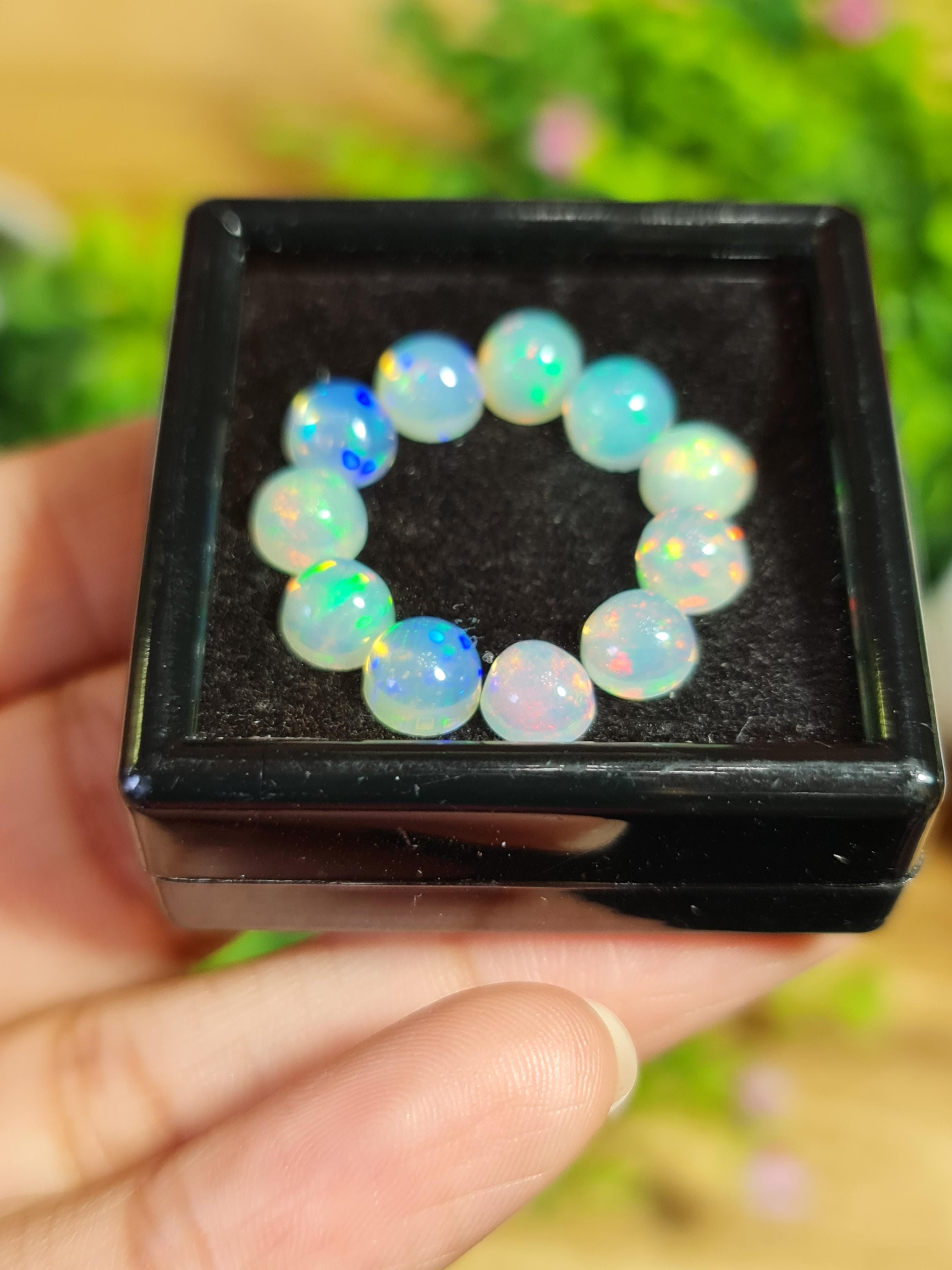 พลอย โอปอล Opal 11 เม็ด (Pcs.) 7.74 กะรัต (Cts.)พลอยแท้ อัญมณีมงคลประจําวันเกิด เครื่องประดับพลอย