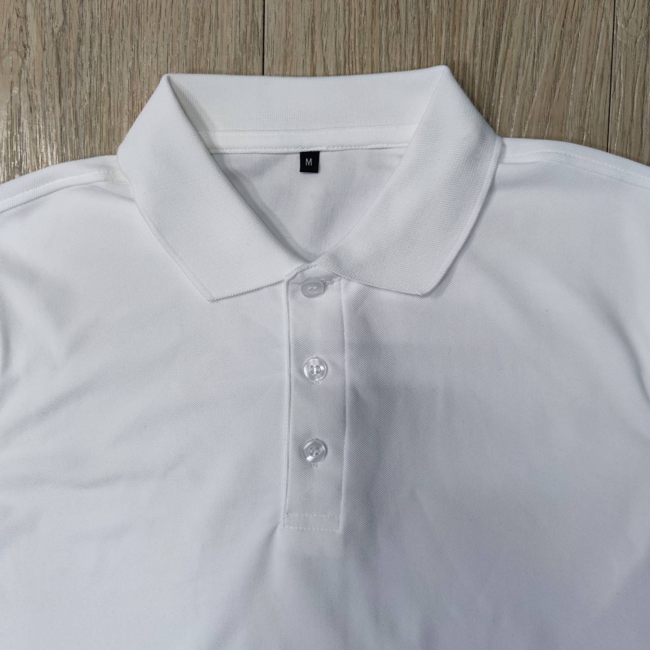 เสื้อยืดผลิตจากขวดพลาสติก 20 ขวด สีขาว