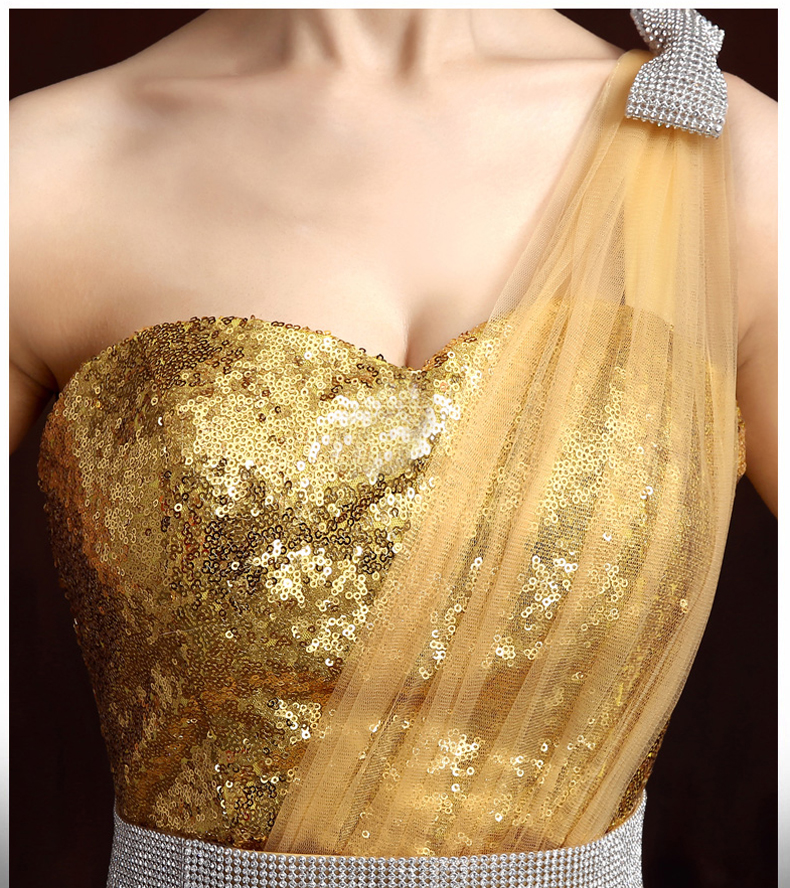 Pre-order ชุดราตรีสั้น เกาะอก/ไหล่เฉียง หน้าสั้นหลังยาว สีทอง เข้ารูปปักเลื่อมทั้งชุด แต่งผ้าโปร่งตาข่าย Sexy ประดับเข็มขัดเงิน&โบว์ที่ไหล่