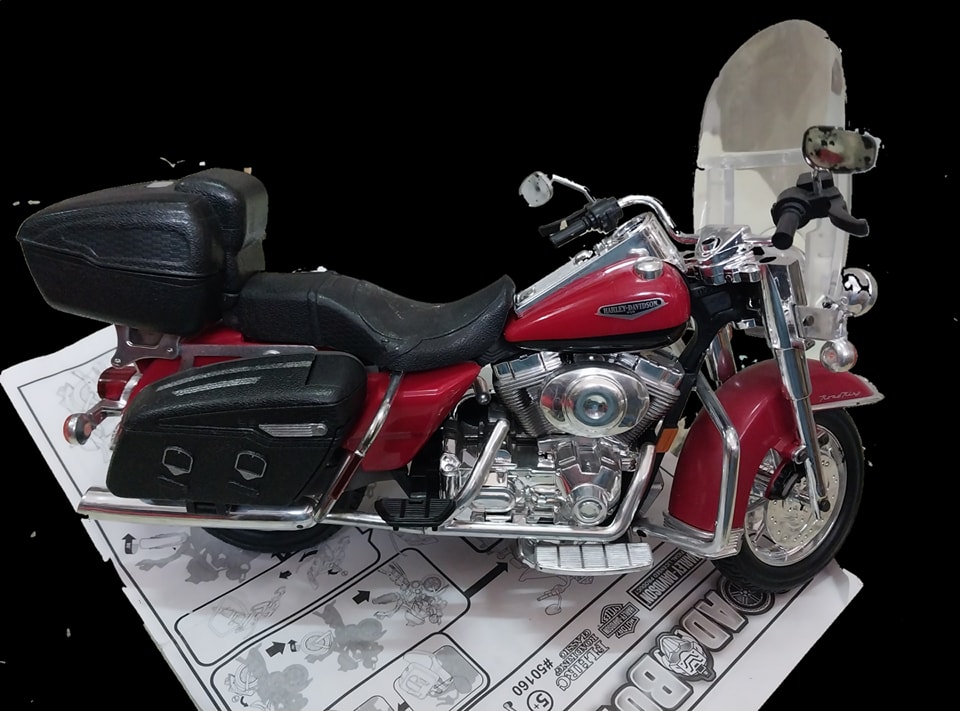 โมเดลรถแปลงเป็นหุ่น รถมอเตอร์ไซค์ Harley Davidson สภาพแกะประกอบ ***ไม่มี :-ขาตั้งรถ และปืนหาย 1 กระบอก