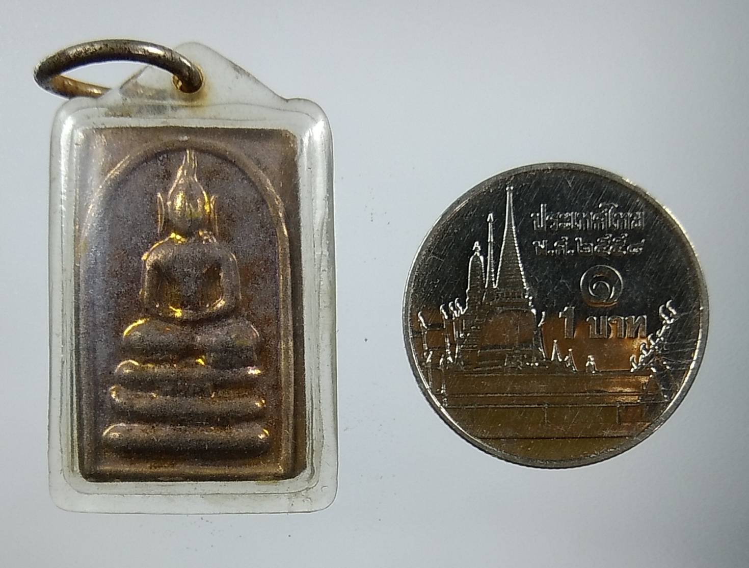 A1244 เหรียญสมเด็จคะแนนหูบายศรี หลังนางกวัก ไม่ทราบที่ครับ