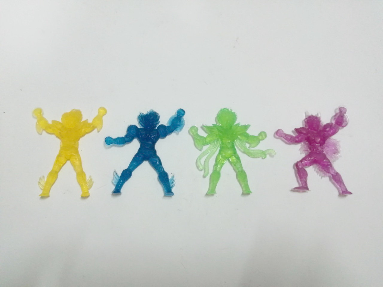 ตุ๊กตุ่นยาง เซนต์เซย่า เปกาซัส เซยย่า(เหลือง) ดราก้อน ชิริว(ม่วง) ฟินิกซ์ อิคคิ(เขียว) ซิกนัส เฮียวกะ(น้ำเงิน)