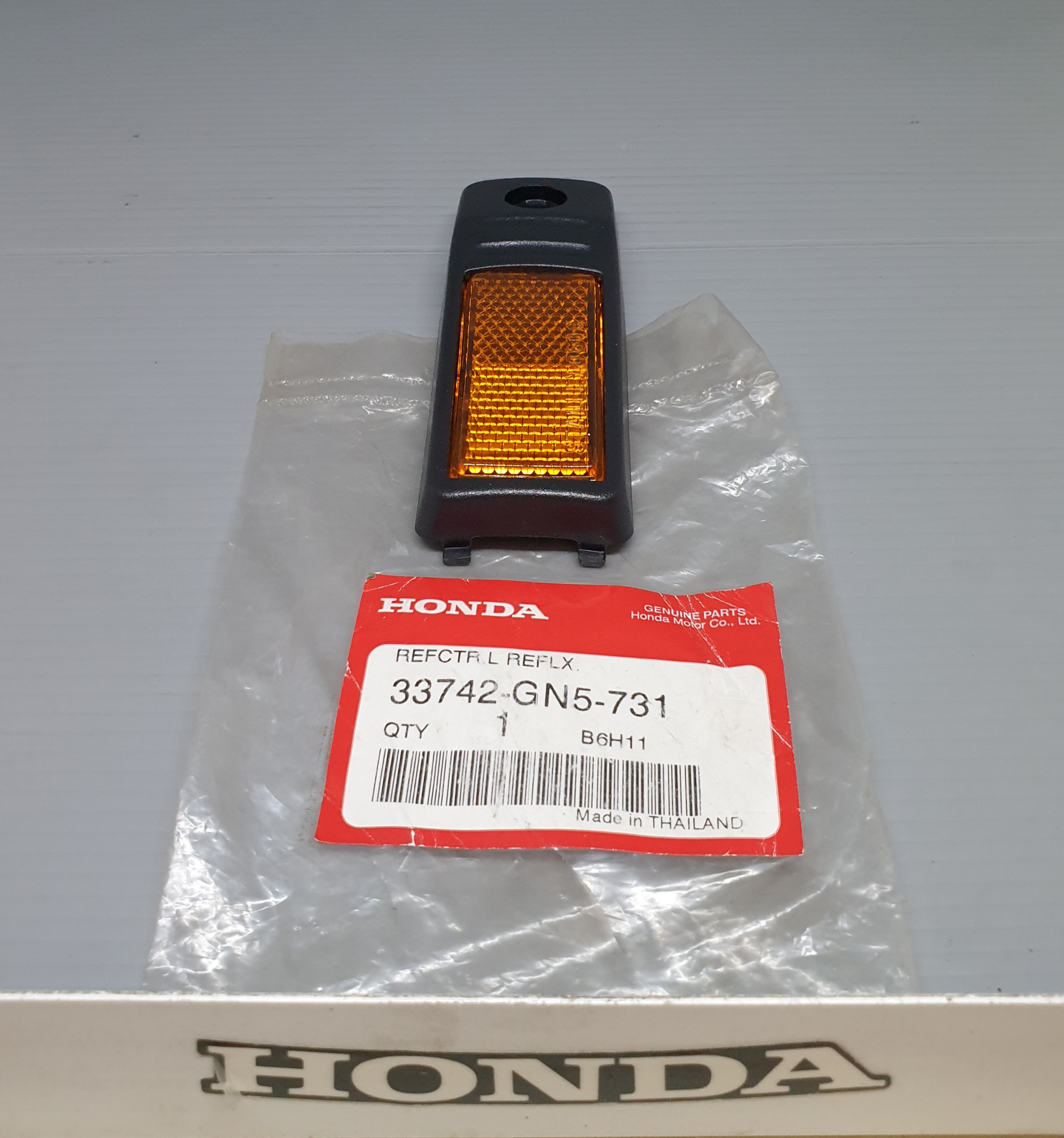 ทับทิมสะท้อนแสงบังโคลนหน้าด้านซ้าย ดรีมC100N,S