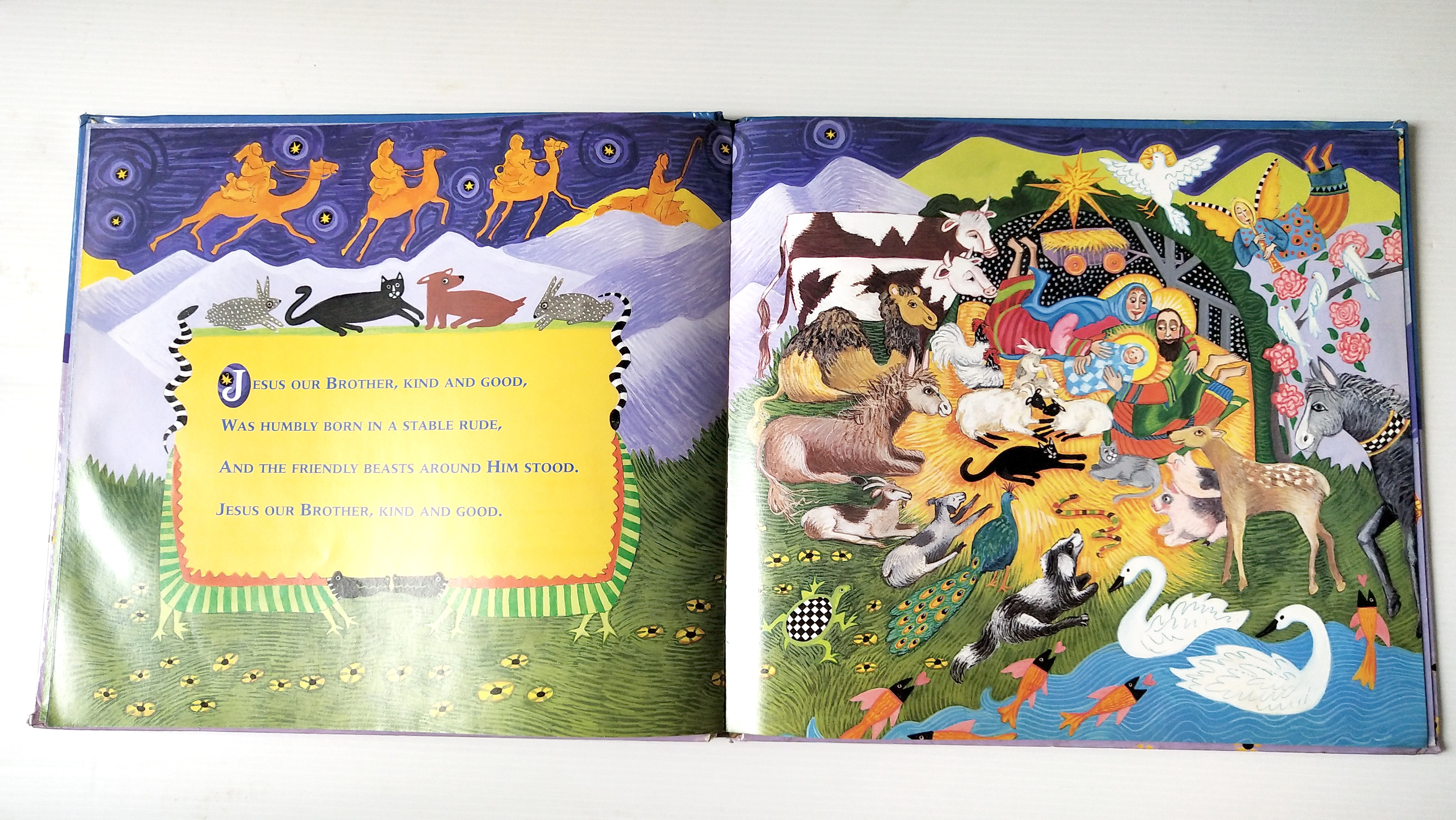 หนังสือนิทาน**มีตำหนิ โปรดดูทุกภาพ ฉบับภาษาอังกฤษ The Friendly Beasts ,a Christmas Carol. ภาพโดย Sharon MacGinley