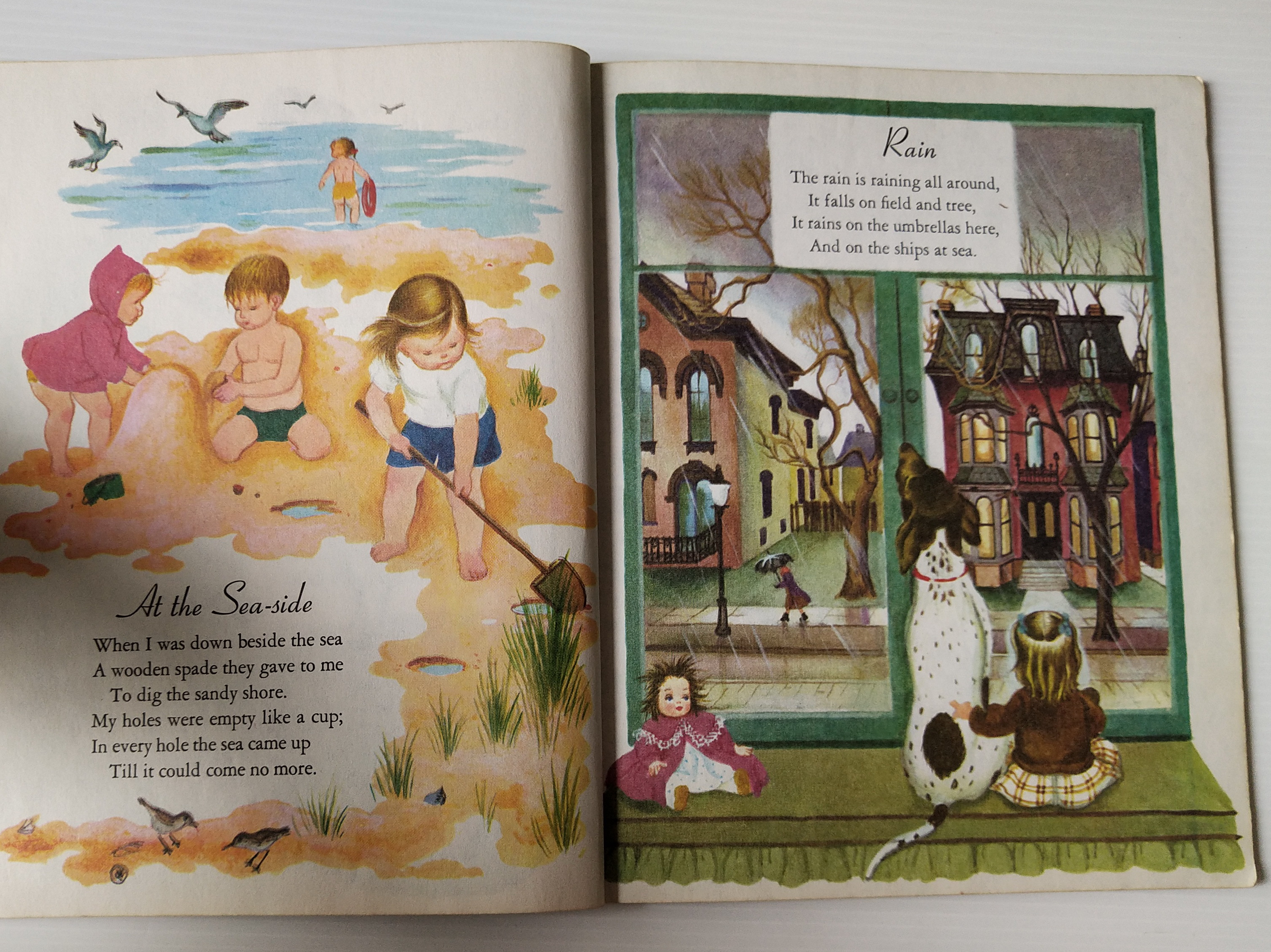 หนังสือภาพสวย **มีตำหนิ โปรดตรวจสอบทุกภาพ ฉบับภาษาอังกฤษ A little golden book, A child's Garden of Verses โดย Robert Louise Stevenson selected and Illustrated by Eloise Wilkin