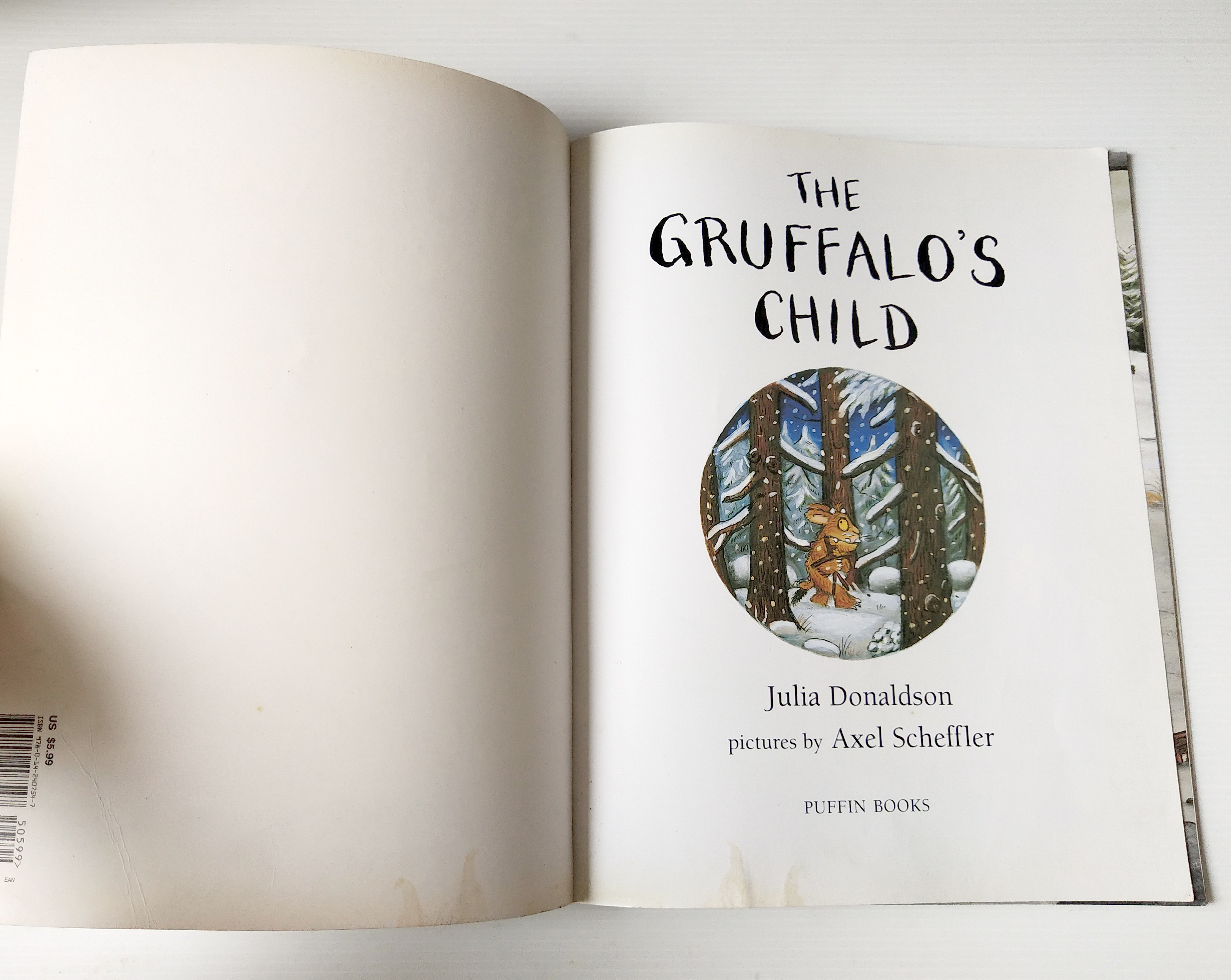 หนังสือนิทาน**มีตำหนิ โปรดตรวจสอบทุกภาพ ฉบับภาษาอังกฤษ The Gruffalo's child โดย Julia Donaldson ,ภาพโดย Axel Scheffler