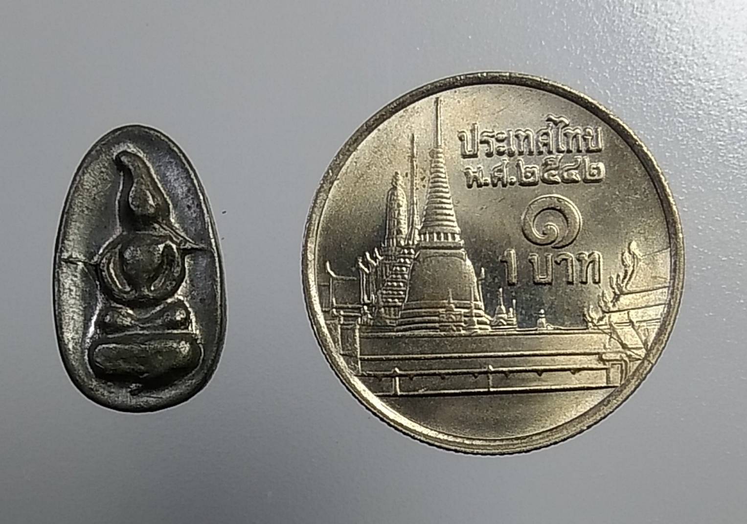 A1030 พระพิจิตรเม็ดข้าวเม่า รุ่นปีฉลองย้อนรอยพิจิตรสถาพร393ปี ปี2540