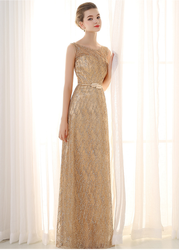 Pre-order ชุดราตรียาว แขนกุด สีทอง แต่งเกล็ด มาพร้อมเข็มขัดรูปใบไม้เข้าชุด เรียบหรู มีซิปหลัง