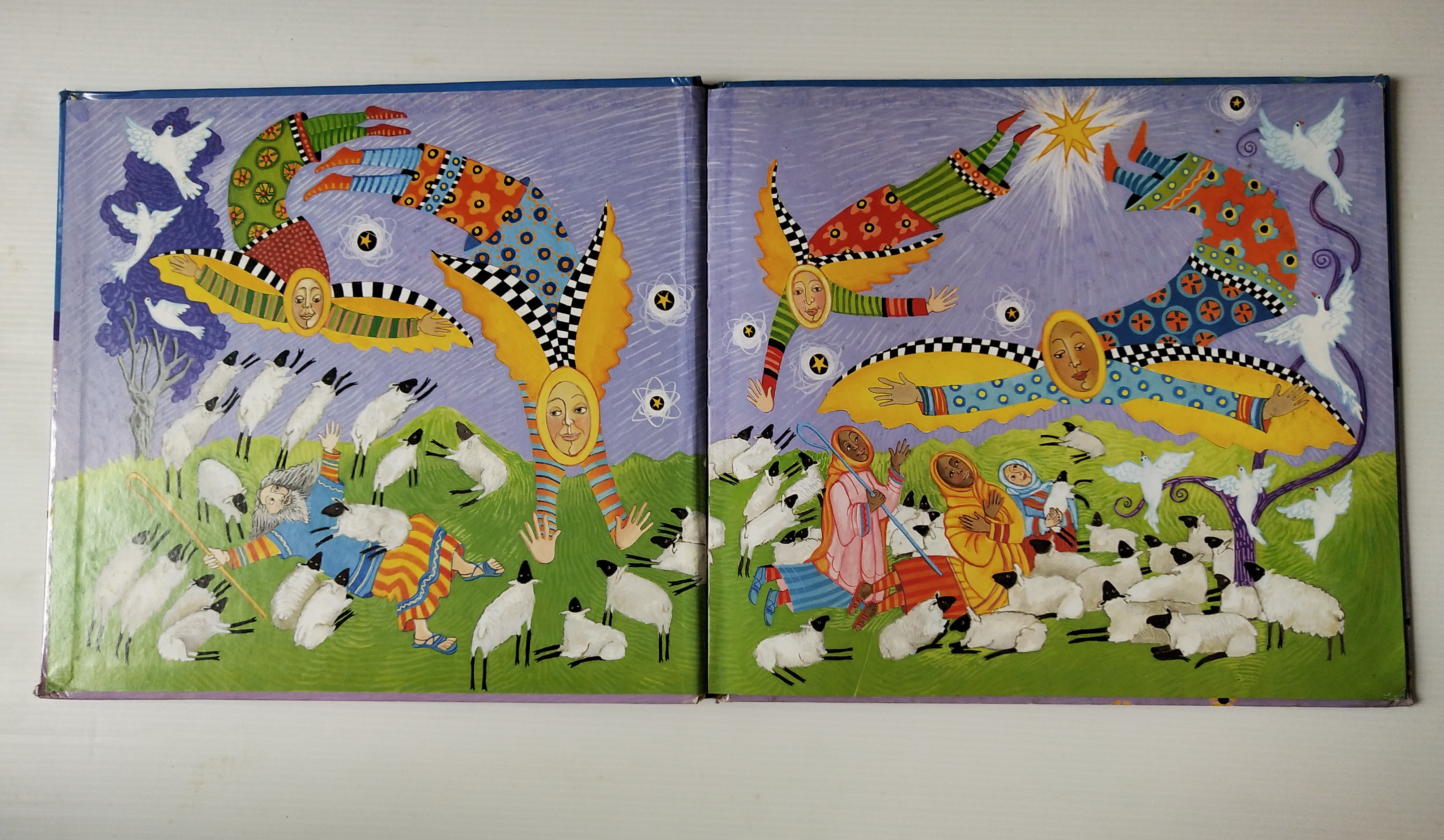 หนังสือนิทาน**มีตำหนิ โปรดดูทุกภาพ ฉบับภาษาอังกฤษ The Friendly Beasts ,a Christmas Carol. ภาพโดย Sharon MacGinley