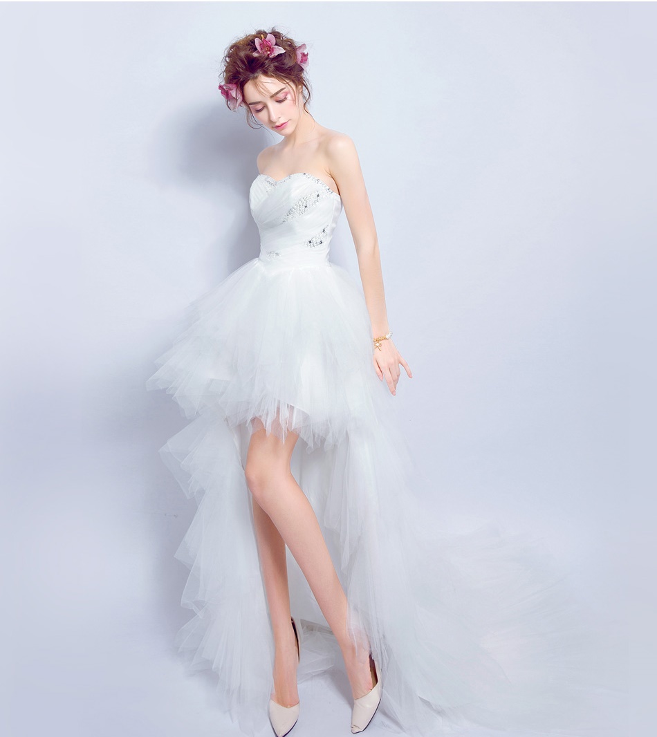 Pre-order ชุดแฟนซี ชุดราตรีสั้น หน้าสั้นหลังยาว สีขาว เกาะอก จับจีบ ปักเลื่อมช่วงอก กระโปรงเป็นชั้น เชือกผูกหลัง