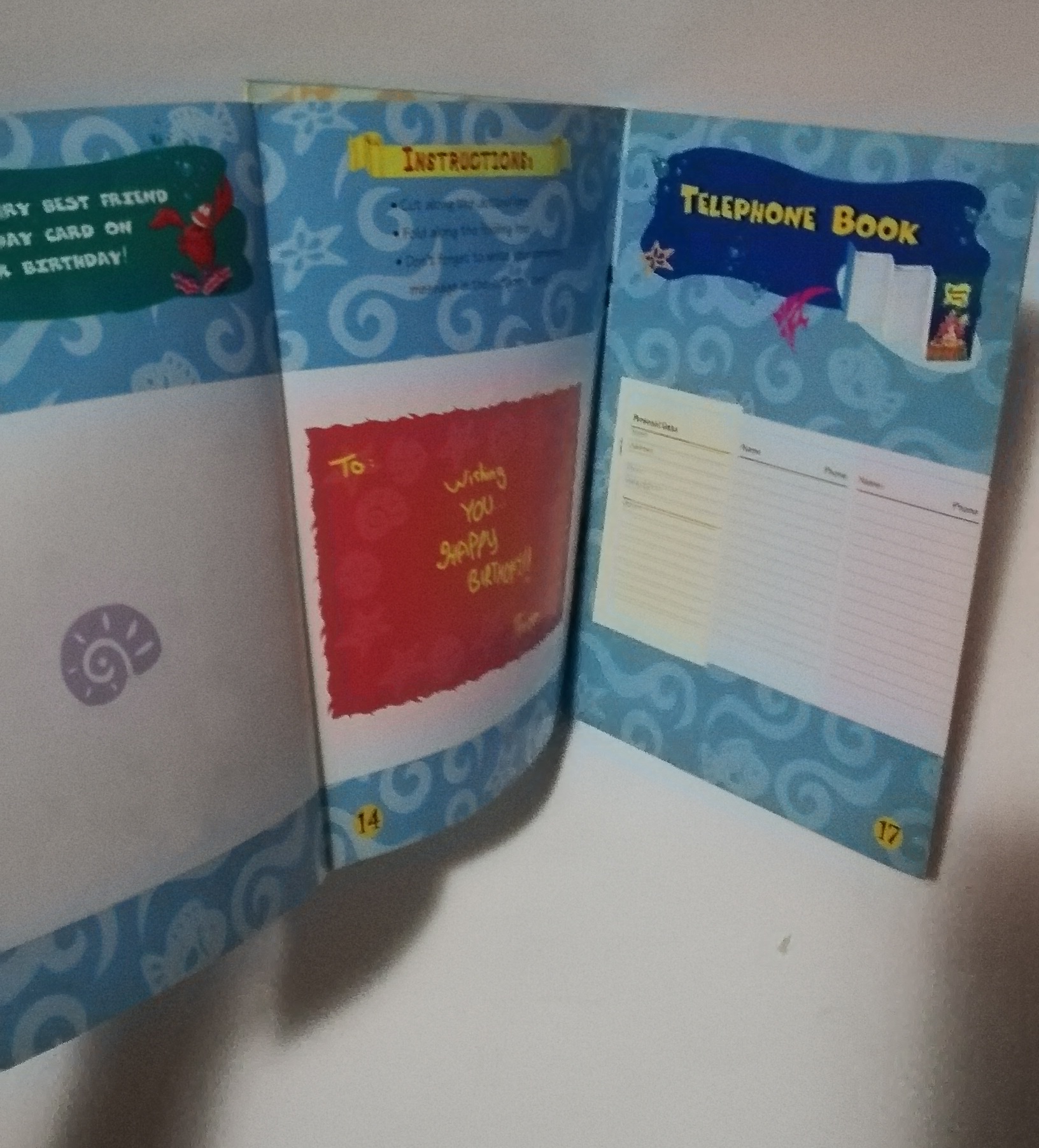 มีหลายภาพ, มีตำหนิ โปรดดูทุกภาพ, สมุดภาพเจ้าหญิงเงือกน้อยแอเรียล, the Little Mermaid ขนาด 19 cm, เป็นสมุดภาพการ์ด ที่คั่นหนังสือ ป้ายสมุดโทรศัพท์การ์ดอวยพรวันเกิดตัวแขวนโทรศัพท์มือถือเป็นกระดาษสแตนดี้และภาพระบายสี เป็นภาพเงือกน้อยแอเรียล Little Mermaid