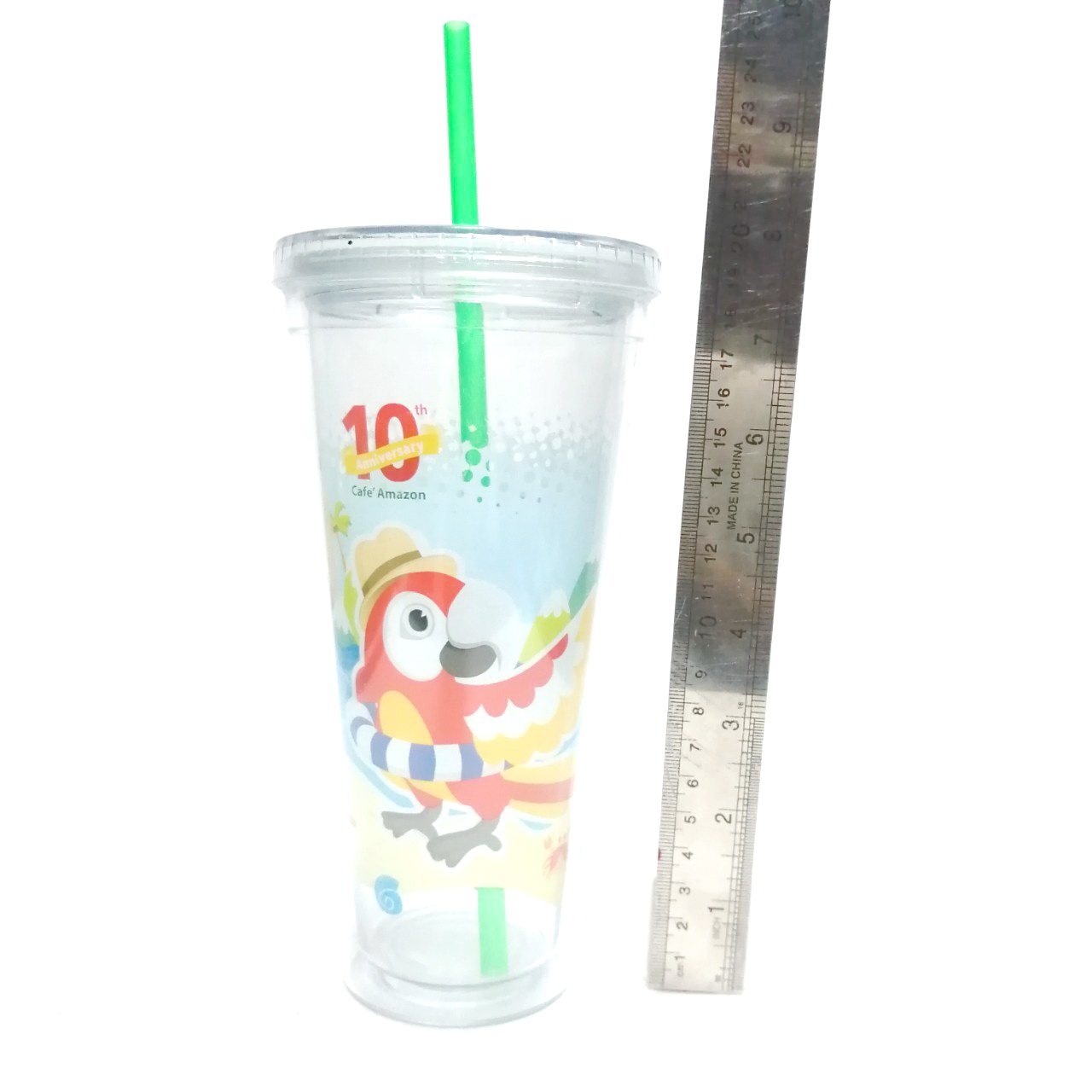 กระบอกใส่น้ำ พรีเมี่ยมครบรอบ10ปี กาแฟอเมซอน ขนาดตามรูป สภาพดี มีรอยบ้าง