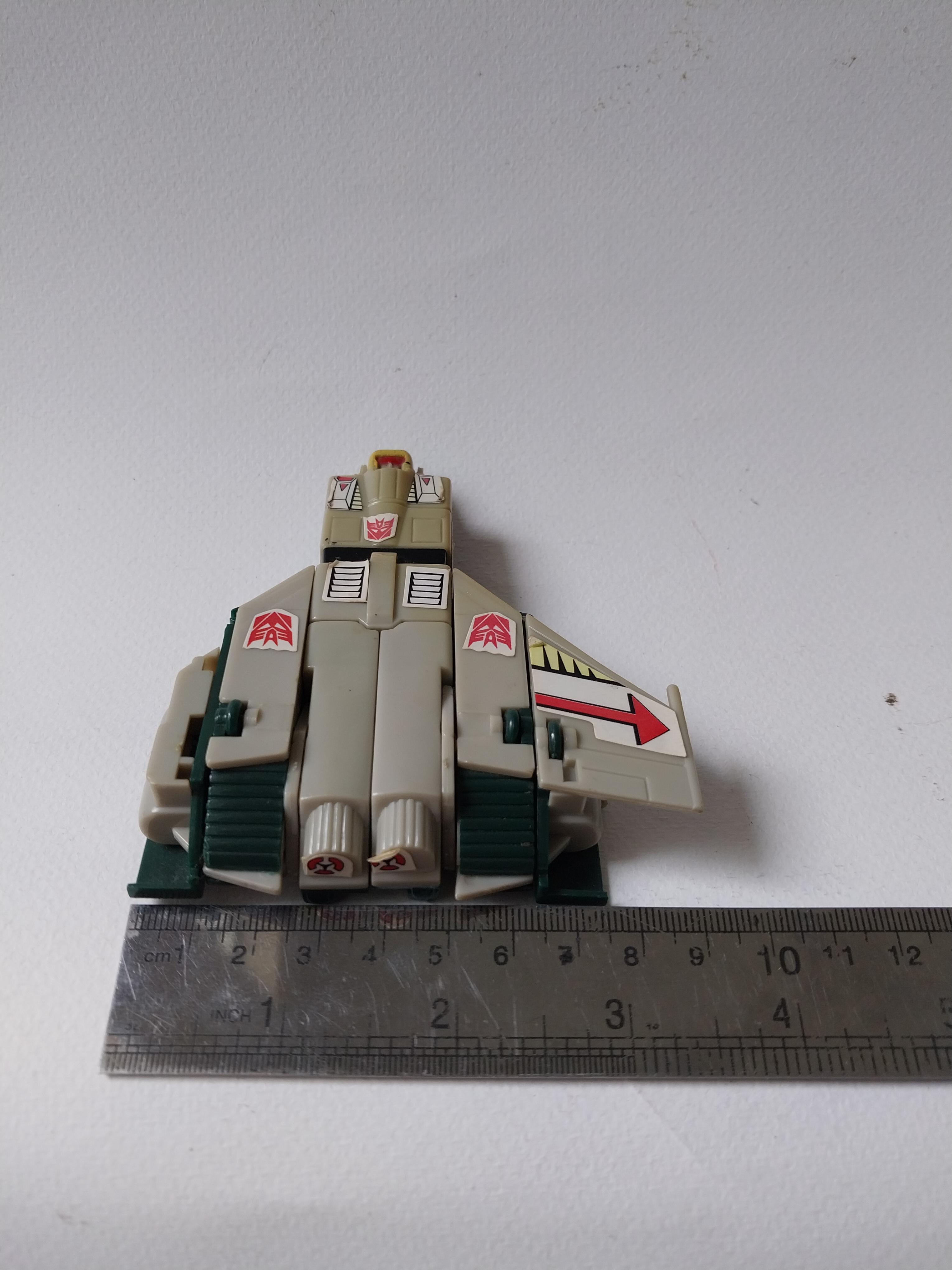 มีหลายภาพ,หุ่นแปลงร่างเป็นยาน ฝ่ายดีเซ็ปติค่อน **ปีก หาย1ข้าง