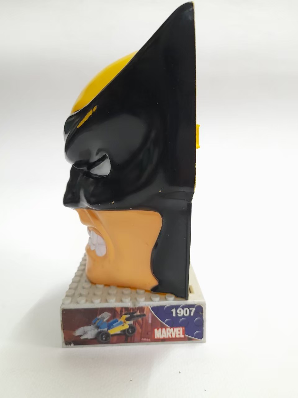 มีหลายภาพ,อกีตที่ใส่ขนม วูฟเวอรีน,หน้า วูลฟ์เวอรีน ฉบับคอมมิค มีฐานวางโชว์ เป็นพลาสติกลงสีสำเร็จ ขนาดตามรูป