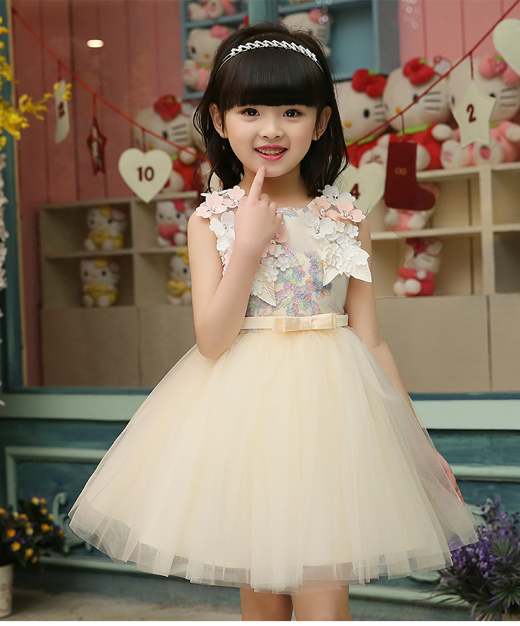 Pre-order ชุดราตรีเด็ก ชุดออกงาน ชุดกระโปรง สไตล์เจ้าหญิง แขนกุด แต่งดอกไม้ช่วงอก คาดเอวด้วยโบว์ กระโปรงตาข่าย มีซิปหลัง