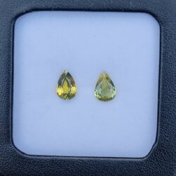 พลอย บุษราคัม yellow sapphire 2.43 กะรัต (Cts.) 2 เม็ด (Pair) ดิบ ไม่ผ่านการเผา (Unheated) พลอยแท้ อัญมณีมงคลประจําวันเกิด เครื่องประดับพลอย