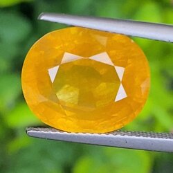 พลอย บุษราคัม เผาใหม่ yellow sapphire 13.51 กะรัต (Cts.) พลอยแท้ อัญมณีมงคลประจําวันเกิด เครื่องประดับพลอย