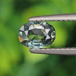 พลอย เขียวส่อง Blue-Green Sapphire 0.77 กะรัต (Cts.) ดิบ (Unheated) พลอยแท้ อัญมณีมงคลประจําวันเกิด เครื่องประดับพลอย