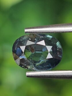 พลอย เขียวส่อง Blue-Green Sapphire 0.95 กะรัต (Cts.) ดิบ (Unheated) พลอยแท้ อัญมณีมงคลประจําวันเกิด เครื่องประดับพลอย