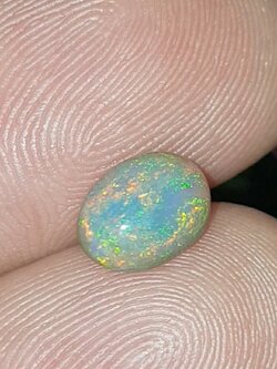 พลอย โอปอล Opal 1.24 กะรัต (Cts.) พลอยแท้ อัญมณีมงคลประจําวันเกิด เครื่องประดับพลอย