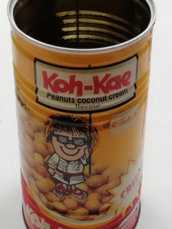 ของสะสม กล่องสังกะสี (กล่องโลหะ) กระป๋องโก๋แก่รสกะทิ กระป๋องทรงกระบอกสีเหลืองแดง เส้นผ่าศุนย์กลางประมาณ 3" ความสูงประมาณ 7"