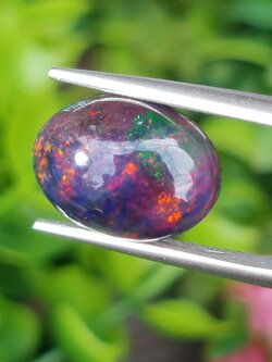 พลอย แบล็ก โอปอล Black Opal 4.23 กะรัต (Cts.) พลอยแท้ อัญมณีมงคลประจําวันเกิด เครื่องประดับพลอย