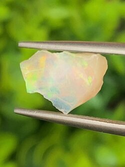 พลอย โอปอล Opal 1.45 กะรัต (Cts.) พลอยแท้ อัญมณีมงคลประจําวันเกิด เครื่องประดับพลอย