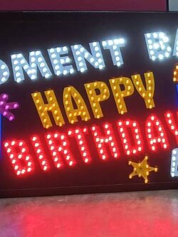 ป้ายไฟเชียร์ happy birthday สำหรับร้านอาหารถือ HBD ลูกค้า