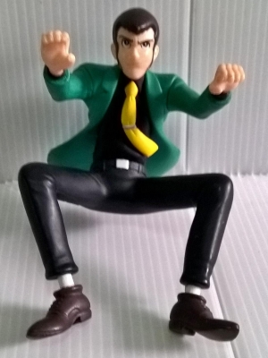 ลูแปงท่าขี่มอเตอร์ไซค์ ขนาดประมาณ 15 cm.