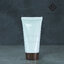 หลอดโฟมสีขาว 50g. ฝาเกลียวสีน้ำตาลลายไม้เข้ม